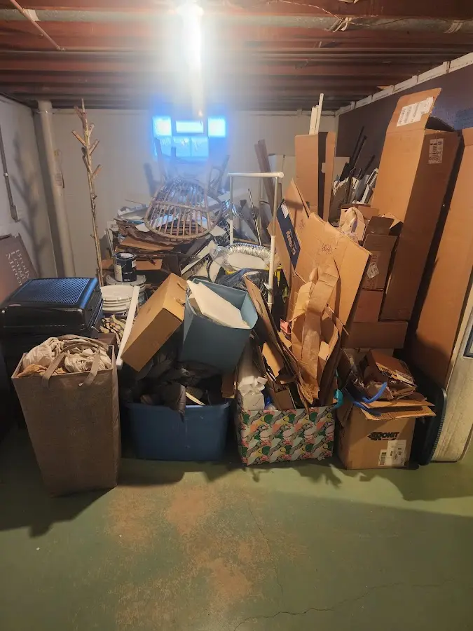 Roll-off dumpster container at job site for 2 Yard Dumpster Rental in Show Low